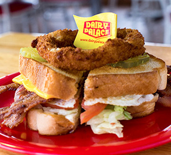 Signature burger sandwich with onion rings at Dairy Palace in Canton TX near Wagon Train RV Park