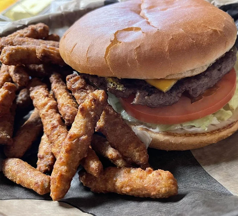 Juicy burger and fries at Ole West Bean & Burger in Canton TX near Wagon Train RV Park